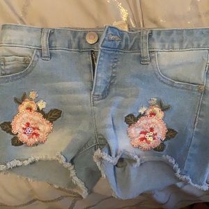 I’m selling Jean shorts from Justice a size ten